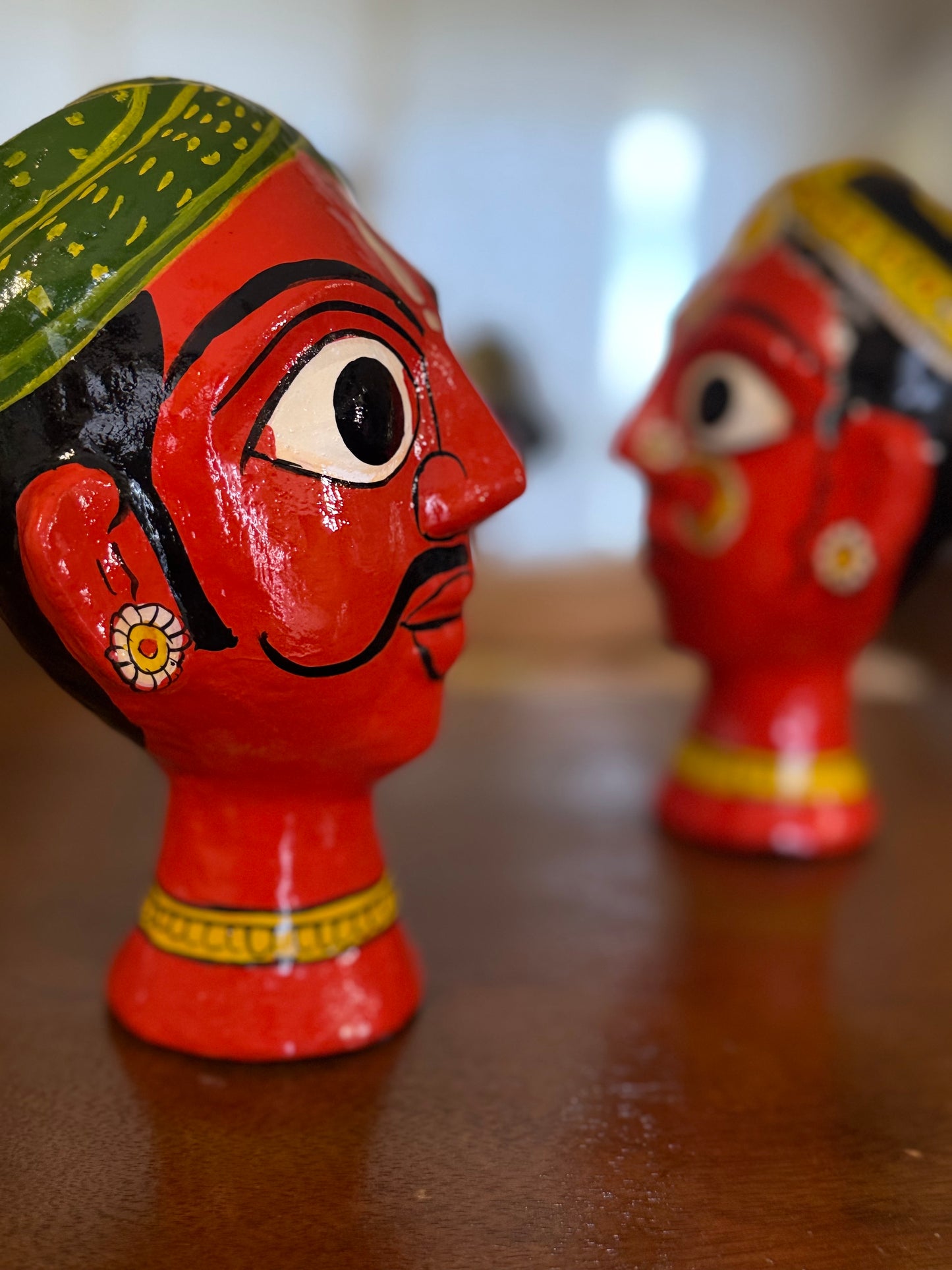Pair of Cherial Busts - Orange